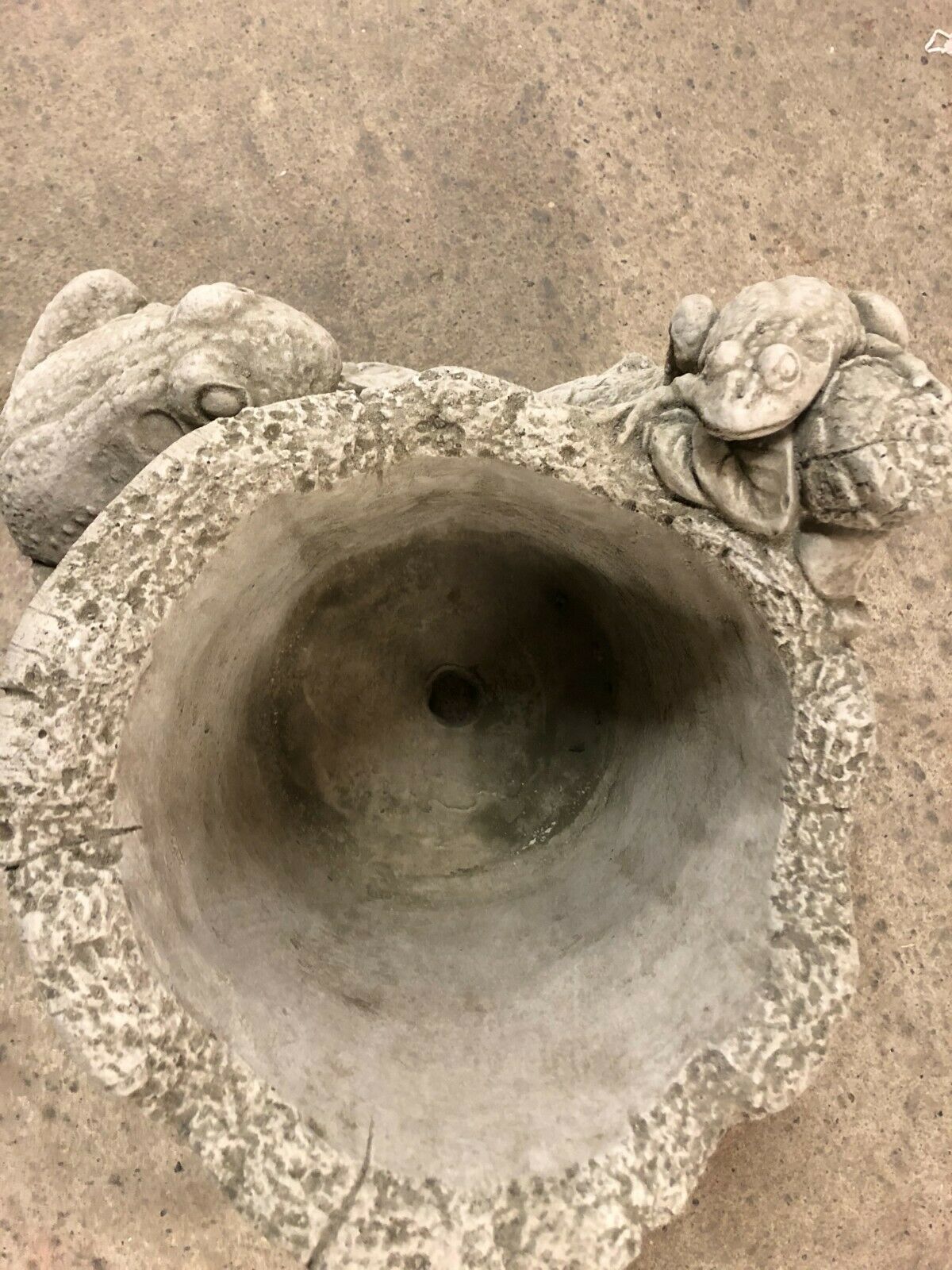 Top view of Stone Frog Garden Planter with central drainage hole, showcasing detailed frog accents and deep planting space for outdoor use.