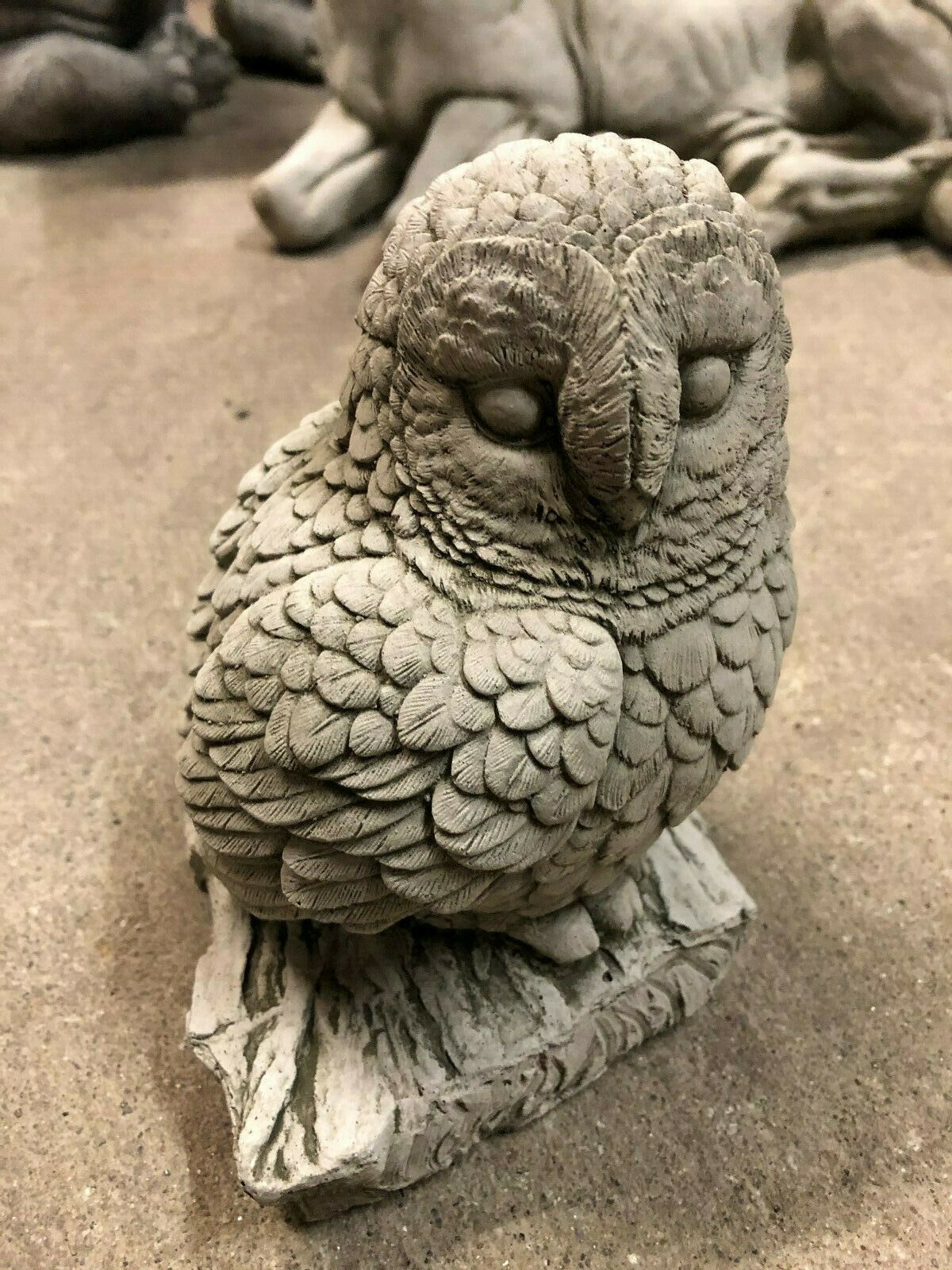 Close-up of Stone Owl on Log Ornament showcasing lifelike craftsmanship and textured limestone finish for decorative garden appeal.