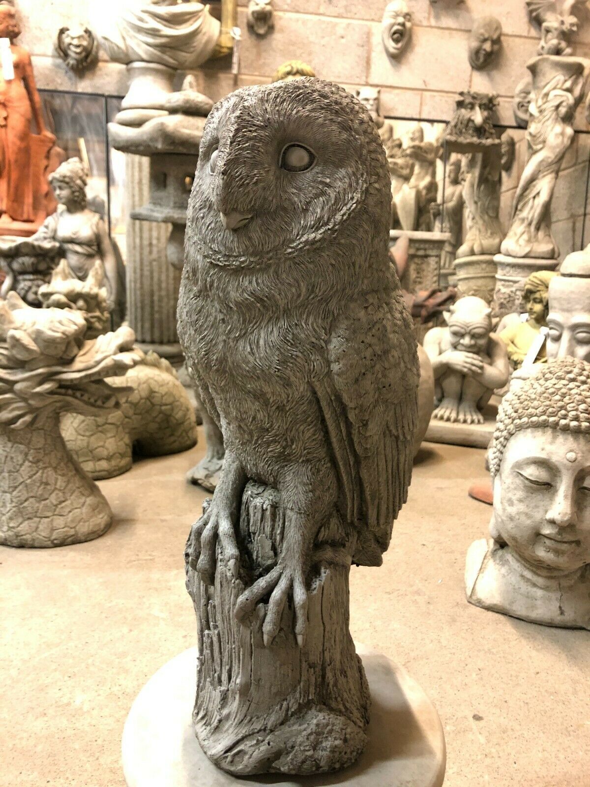 Close-up front view of Stone Owl Plinth Statue - Garden Decor | Solid Limestone showing intricate carving and antique finish.