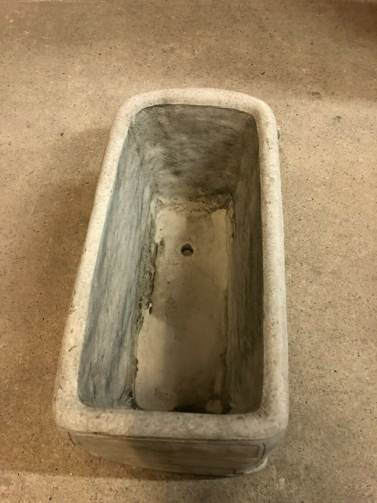 Top view of Stone VW Camper Van Planter showing spacious interior with central drainage hole for optimal plant health.