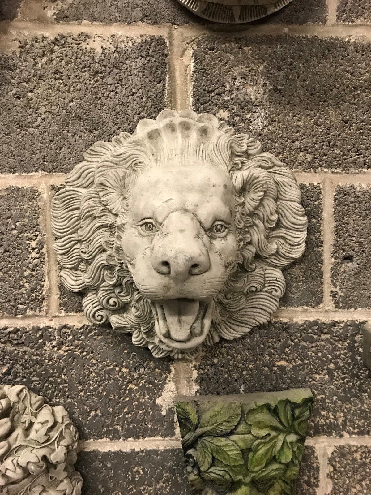 Symmetrical view of Stone Lion Garden Water Spout with antique limestone texture. Enhances garden aesthetics with a regal touch.