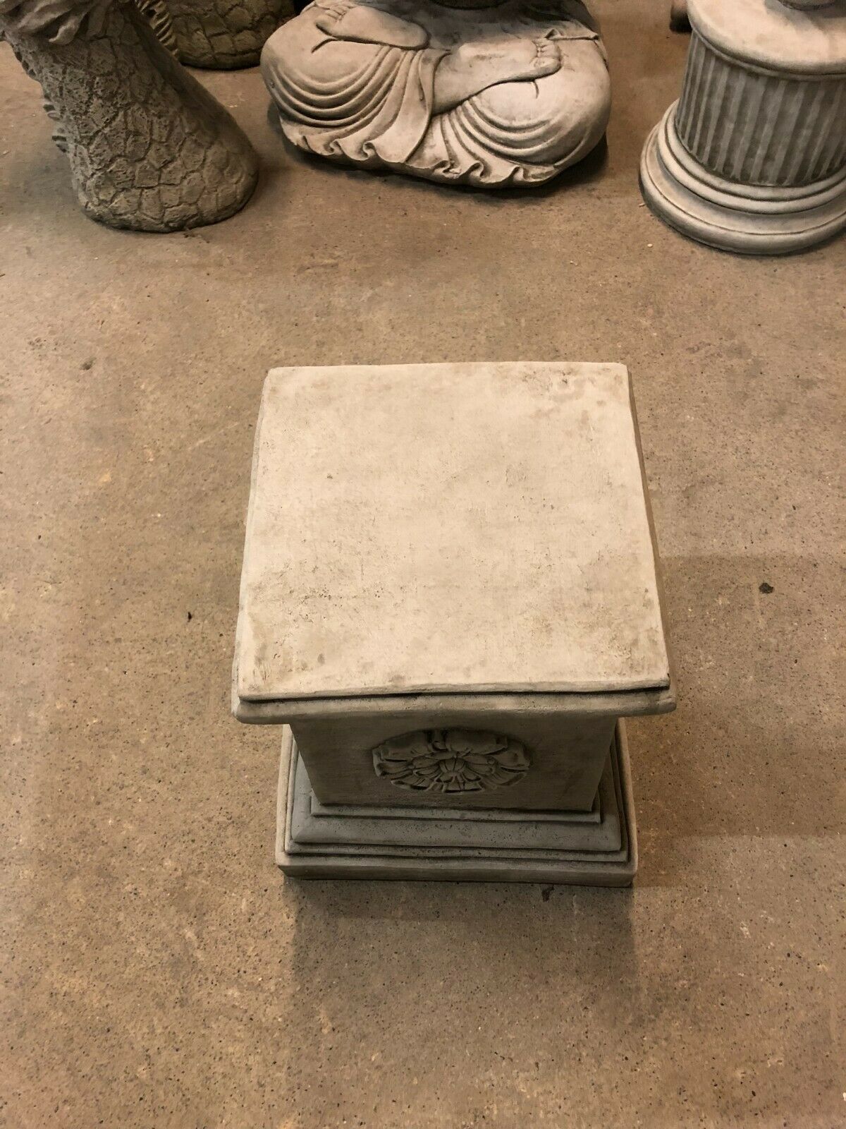 Top view of Yorkshire Rose Square Plinth showing flat surface for statue placement, made from heavy limestone for outdoor durability.