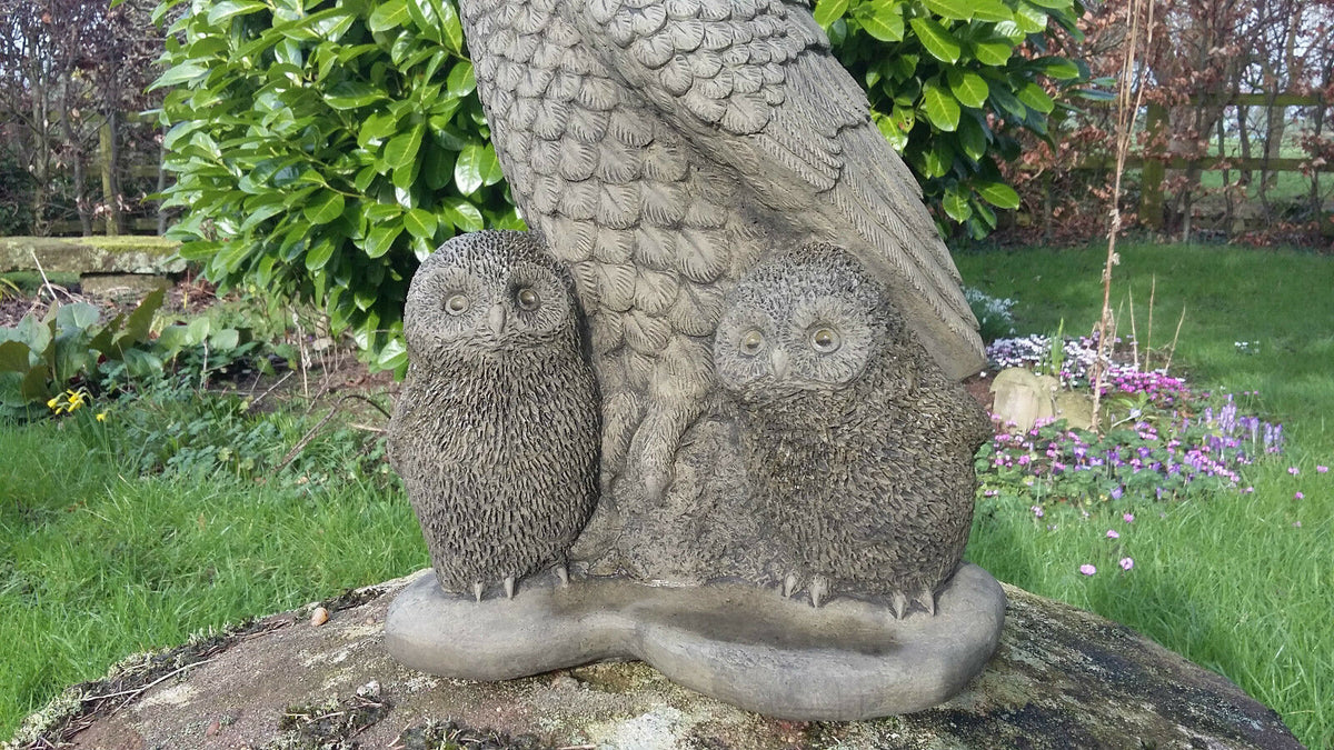 Close-up of the owlets in the Stone Owl Garden Statue, emphasizing fine stone detailing and charming expression for decorative garden appeal.