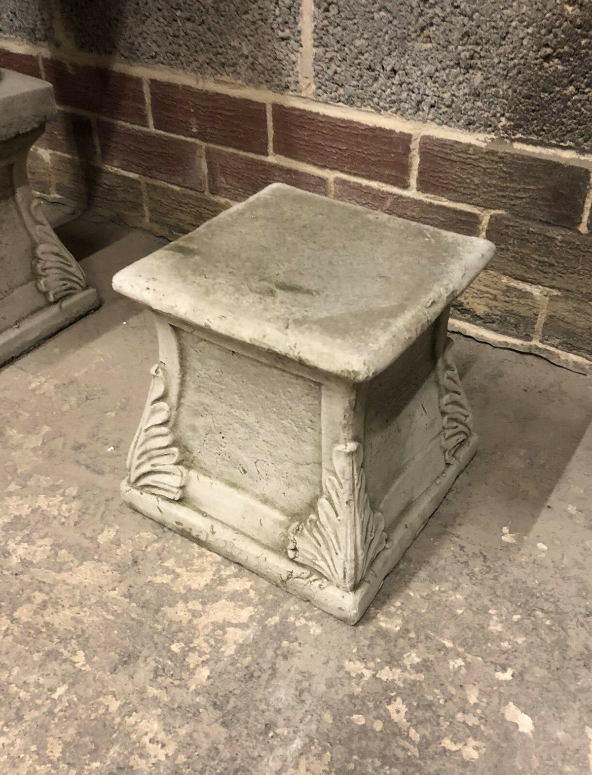Classic Leaf Plinth in limestone finish, designed for garden use as a decorative base for sculptures, planters, or ornaments.