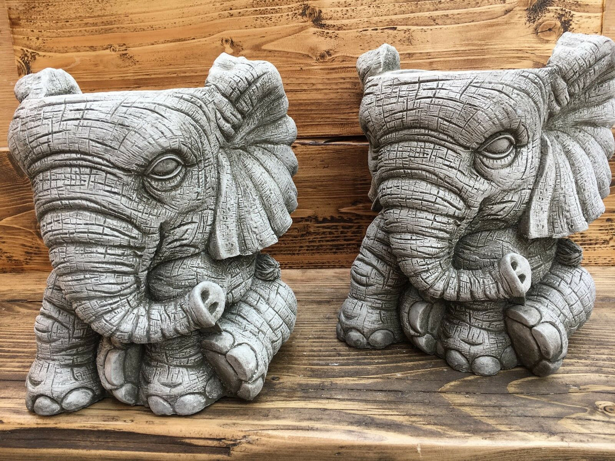 Pair of Stone Elephant Planters with matching antique finish, ideal for symmetrical garden decoration or patio accents.