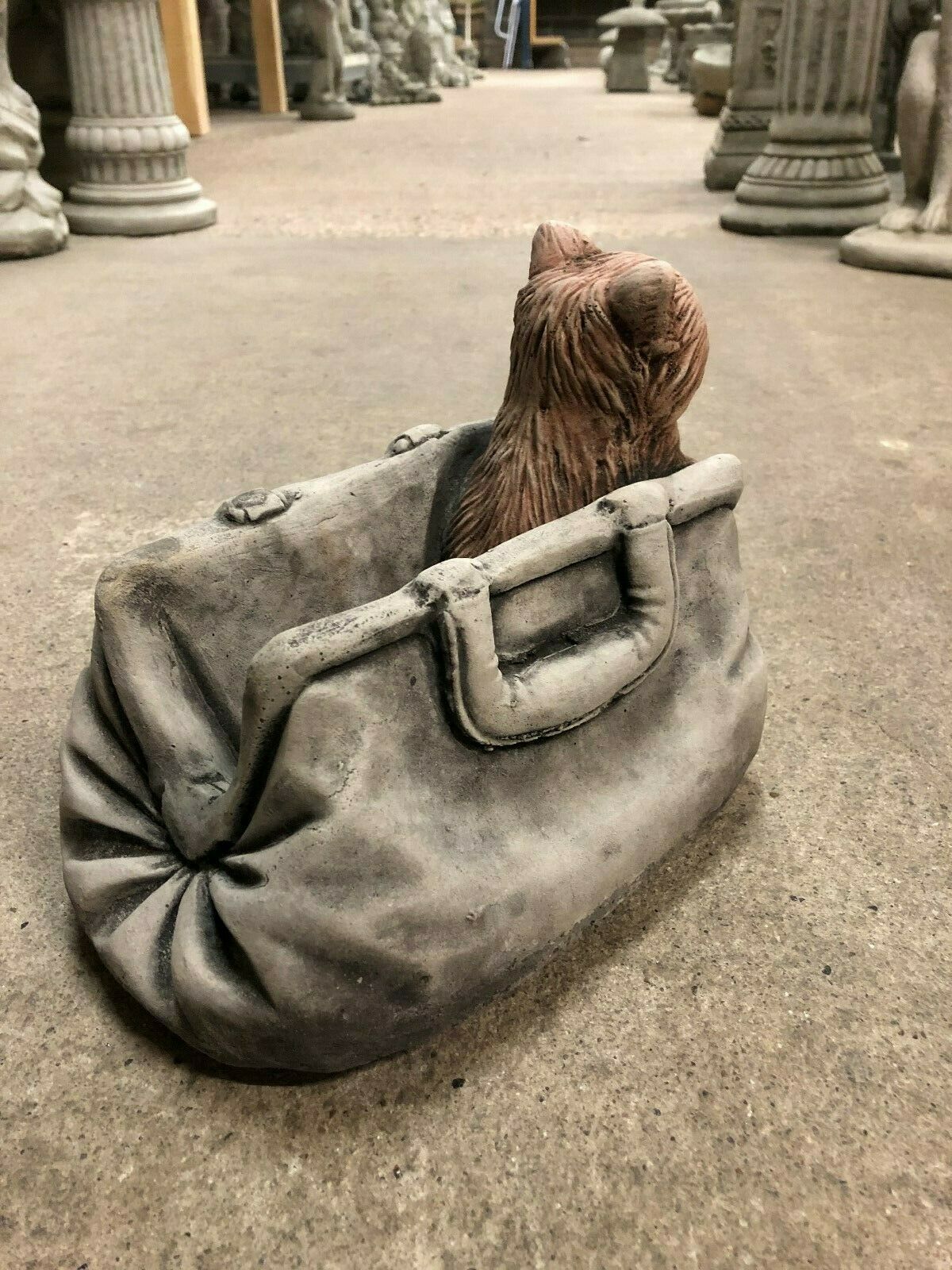 Back angle of Stone Cat In Bag Planter highlighting realistic handbag folds and sculpted cat figure, ideal for garden or balcony decor.