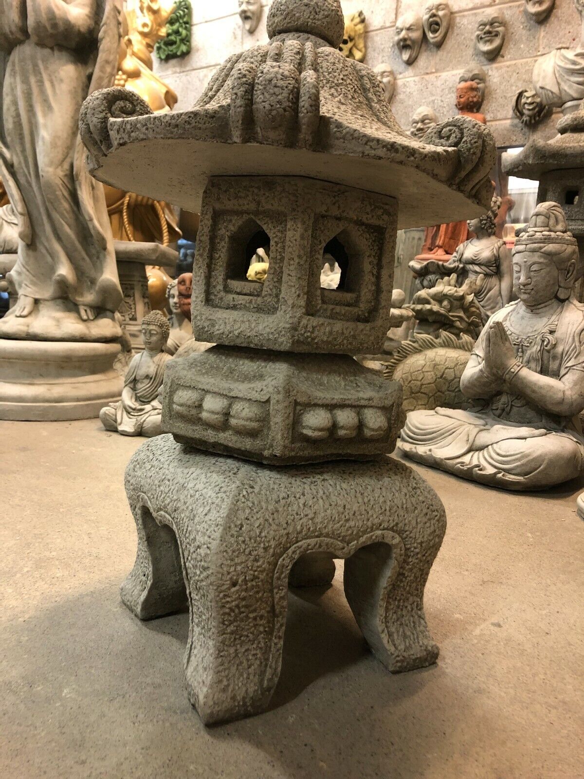 Close-up side angle of Stone Pagoda Lantern highlighting detailed window carvings and sturdy base for garden or patio display.