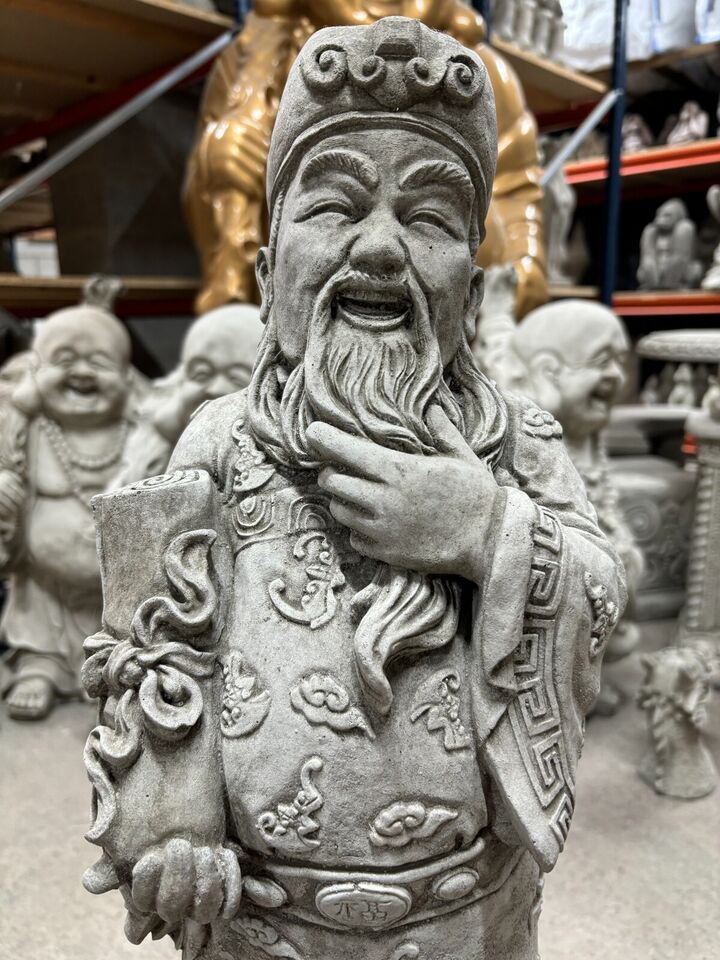 Close-up of intricately detailed Stone God of Longevity statue with scroll and beard, crafted in durable limestone for outdoor garden use.