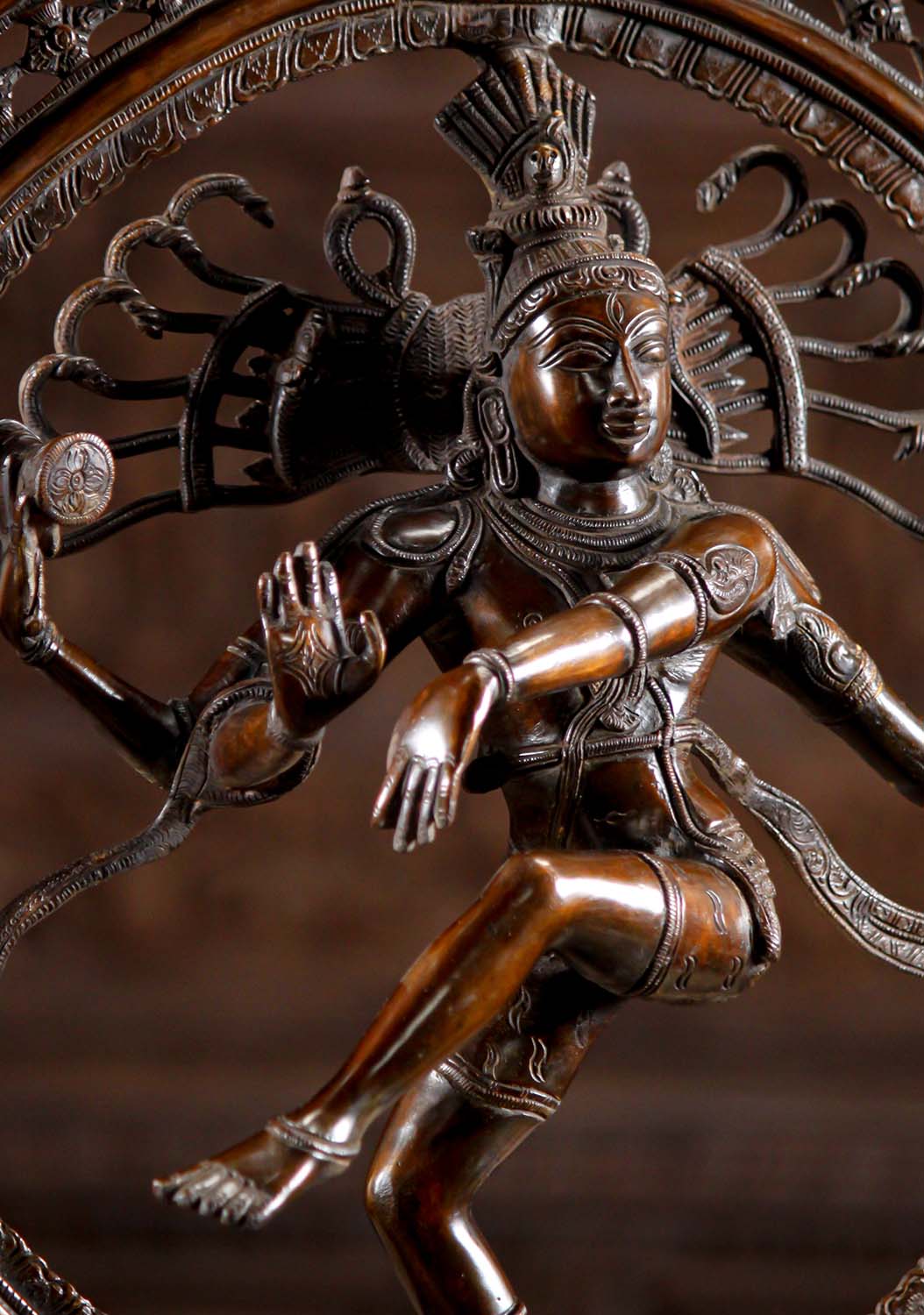 Side facial close-up of Brass Dancing Shiva Statue - Cosmic Art | Timeless Symbol 27", highlighting divine expression and detailed ornamentation.