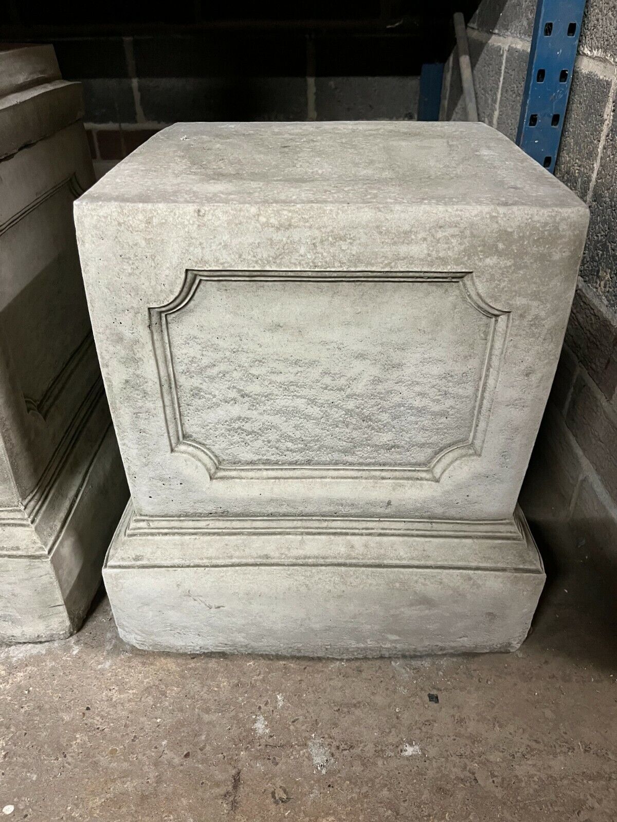 Large classic stone garden plinth with antique finish and panel detailing, ideal for outdoor statue or planter display. Measures 45cm in height.