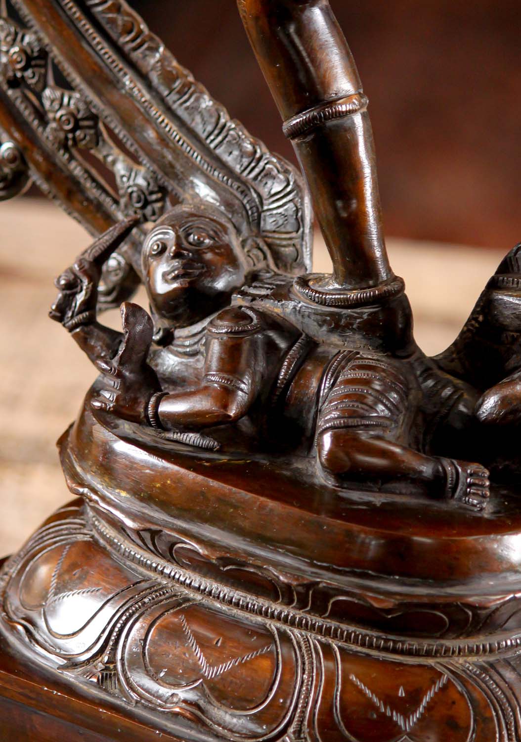 Detailed base view of Brass Dancing Shiva Statue - Cosmic Art | Timeless Symbol 27" featuring Apasmara figure and lotus pedestal carvings.