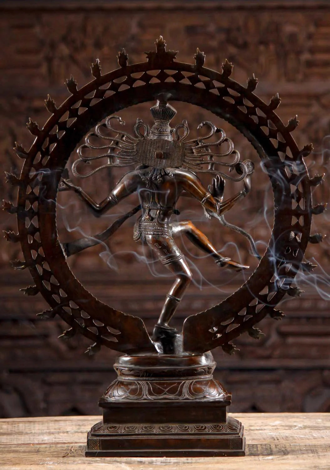 Rear view of Brass Dancing Shiva Statue - Cosmic Art | Timeless Symbol 27" with incense smoke, highlighting intricate back detailing and symbolism.