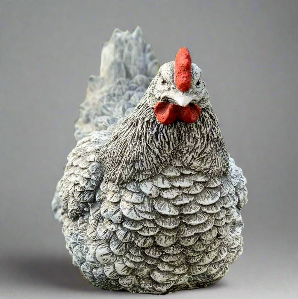 Front view of hand-painted stone chicken statue, 23cm wide, frost-resistant garden ornament with detailed feather texture.