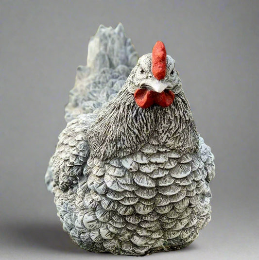 Front view of hand-painted stone chicken statue, 23cm wide, frost-resistant garden ornament with detailed feather texture.