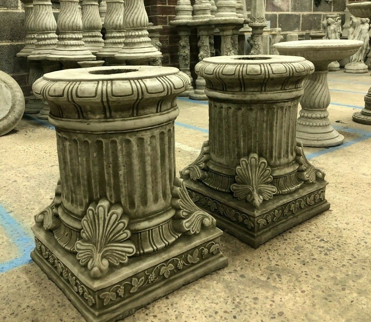 Fine Limestone Classical Design Plinths featuring intricate carvings and solid square bases, perfect for enhancing traditional garden aesthetics.