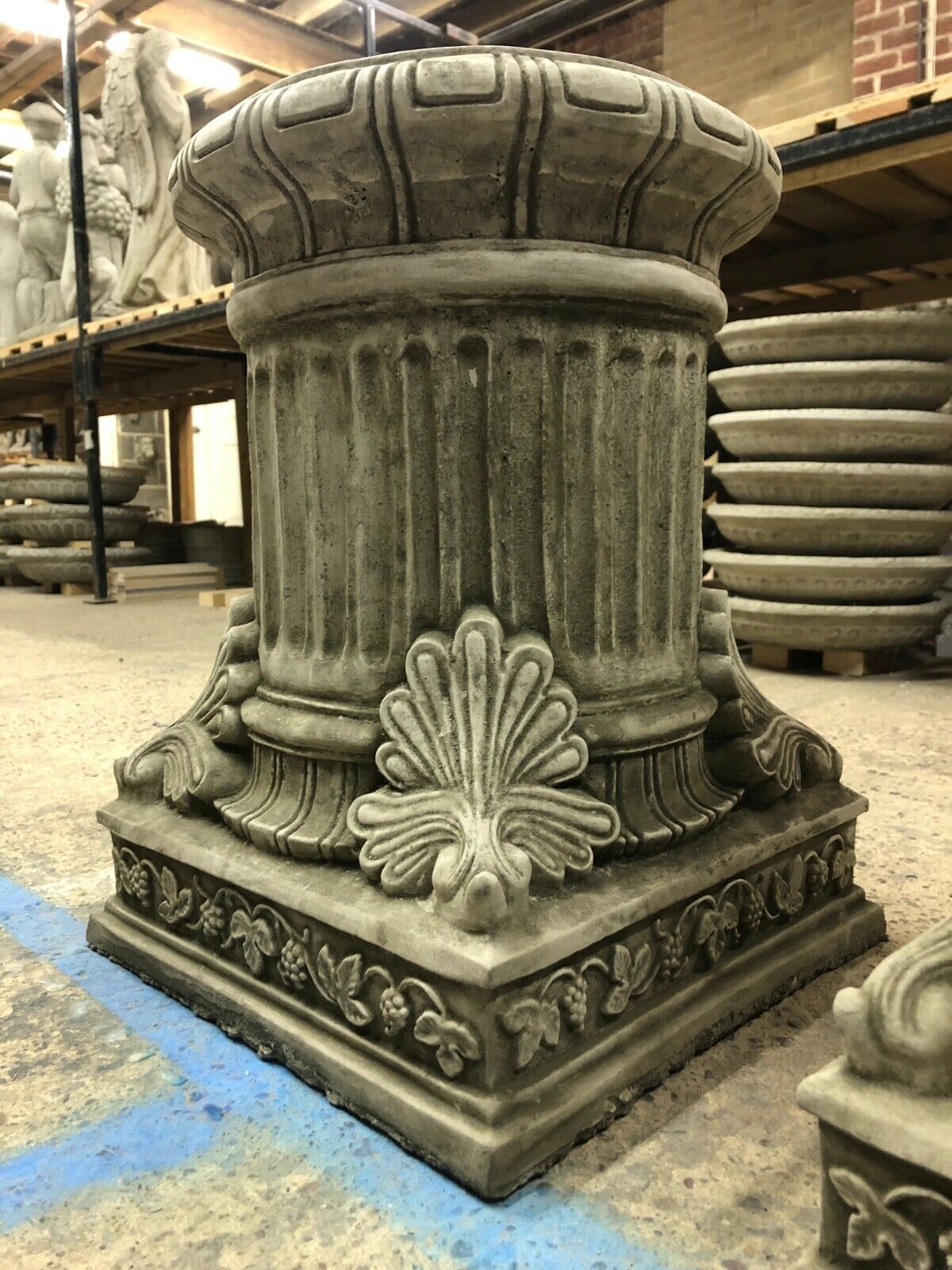 Single Stone Garden Plinth with classical fluting and ornate base, crafted from durable limestone for long-lasting outdoor use.