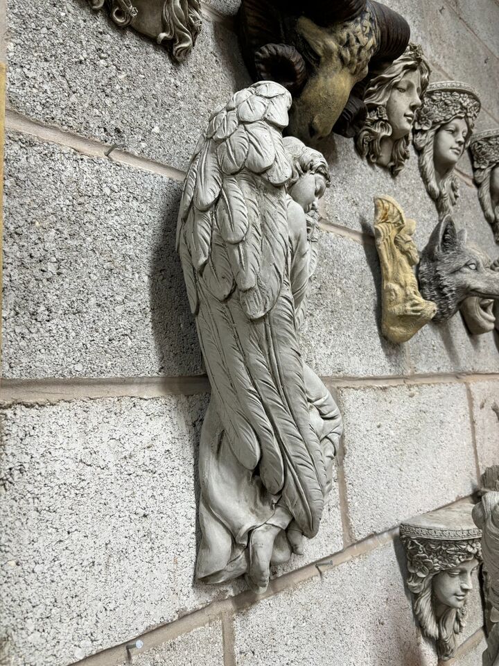 Rear angle of the antique-finish Winged Angel Garden Plaque highlighting the sculpted wings and 3D relief depth for garden decor.