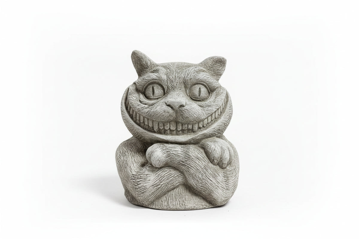 Statue of a cat with a wide smile in a workshop setting