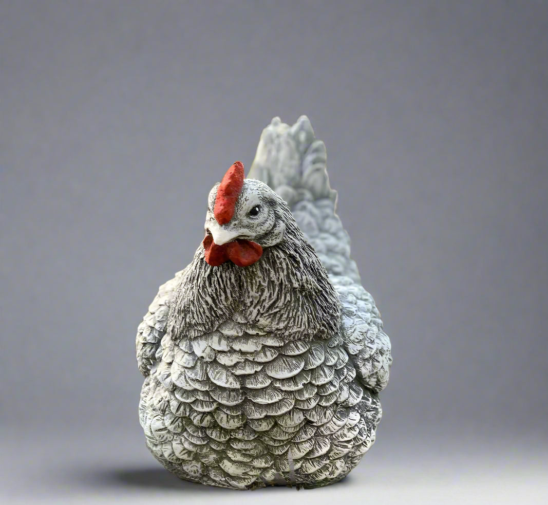 Charming stone chicken statue for garden décor, hand-painted with red comb and realistic feather detailing, ideal for outdoor use.