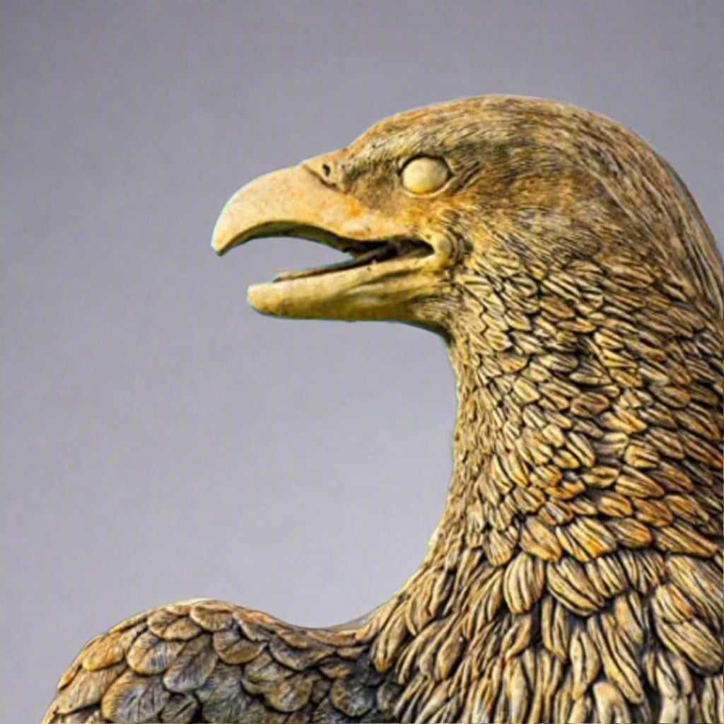 Close-up of XL Eagle Stone Statue head with lifelike beak and textured feathers. Handcrafted for symbolic strength in garden settings.