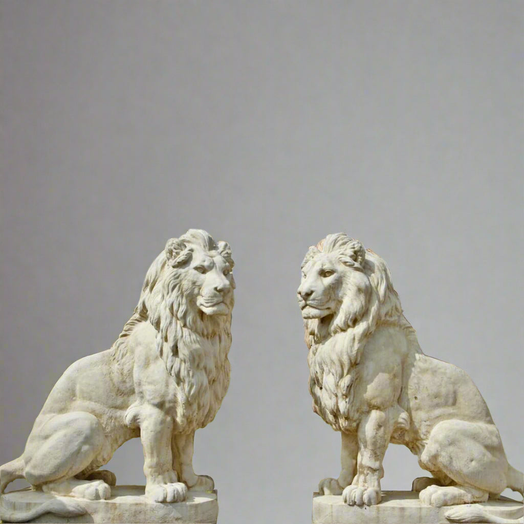 Majestic Stone Lion Statues - XL White Stone pair seated on platforms, ideal for guarding entrances and estate pathways with regal presence.