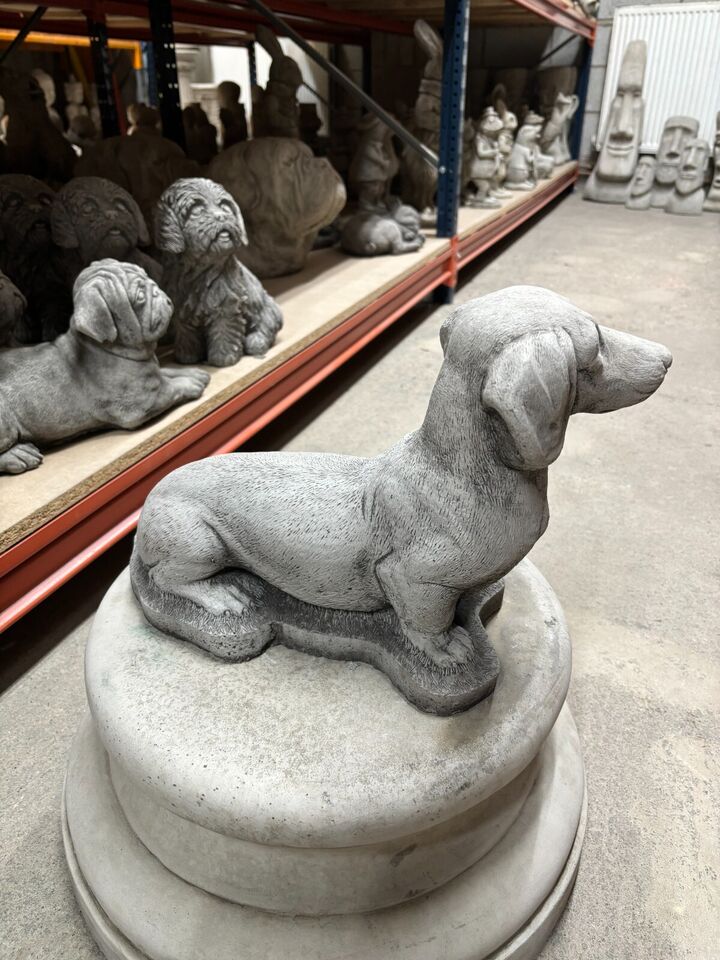 Side profile of durable Stone Dachshund Garden Ornament. Ideal for outdoor spaces, crafted for year-round weather resistance.