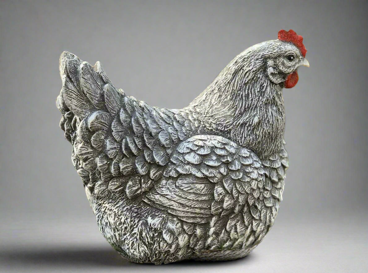 Detailed left-side view of hand-painted stone chicken garden statue, showcasing textured feathers and durable cement craftsmanship.
