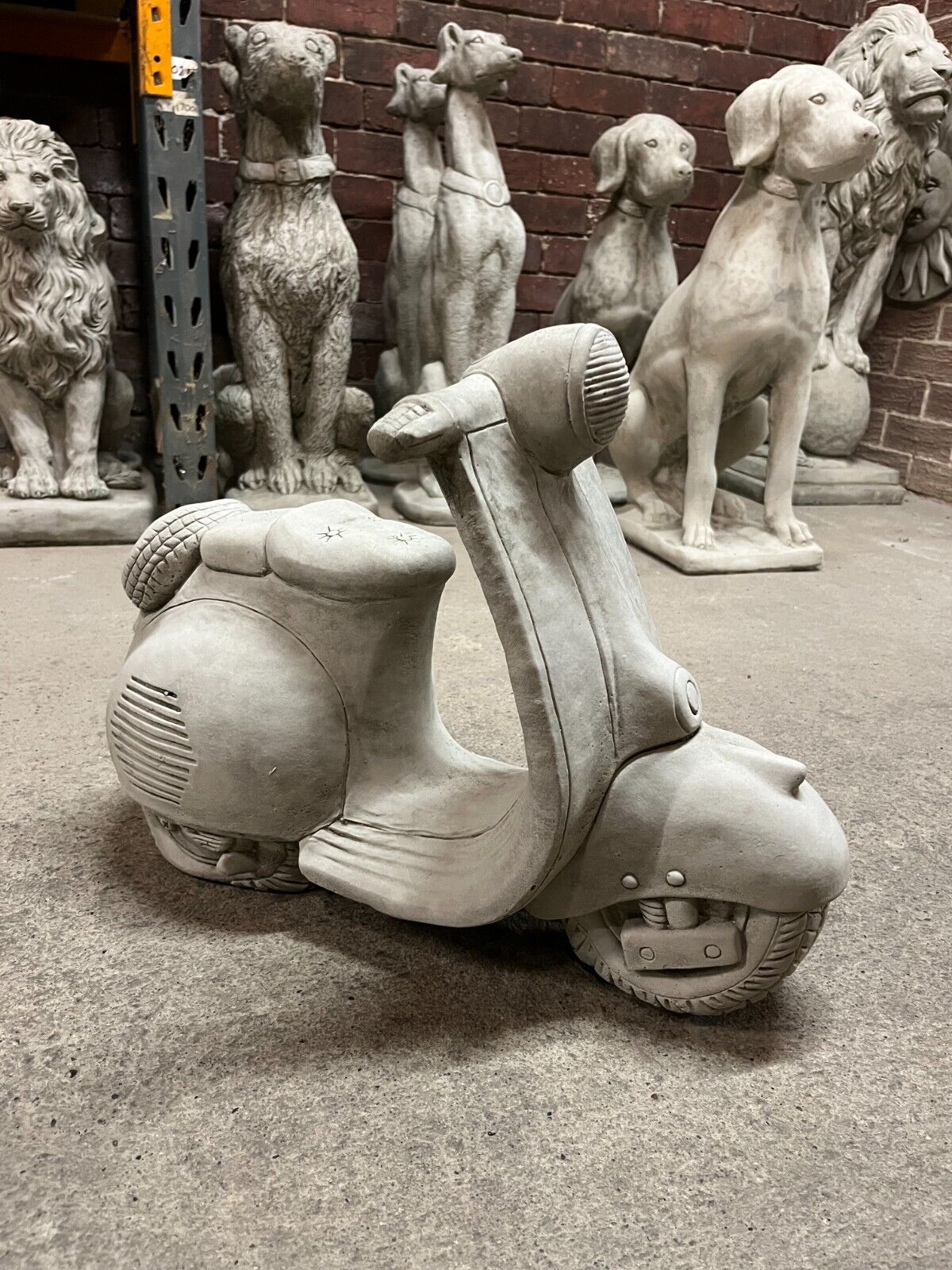 Right side view of Vesper Motorbike Garden Ornament with lifelike limestone craftsmanship, ideal for enhancing garden aesthetics.