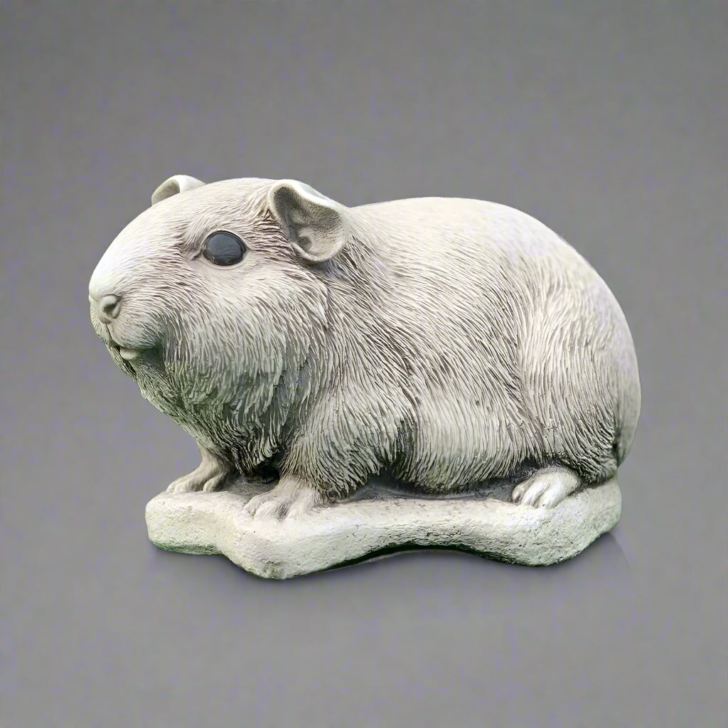 Guinea Pig Ornament - Concrete Garden Decor featuring a lifelike guinea pig sculpture with textured fur, ideal for outdoor charm in lawns or patios.