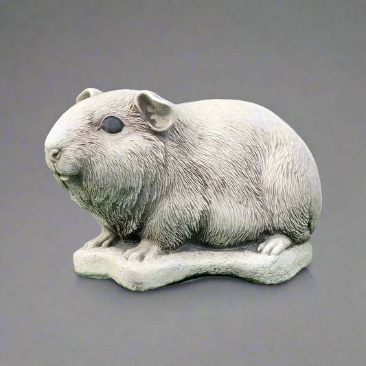 Guinea Pig Ornament - Concrete Garden Decor featuring a lifelike guinea pig sculpture with textured fur, ideal for outdoor charm in lawns or patios.