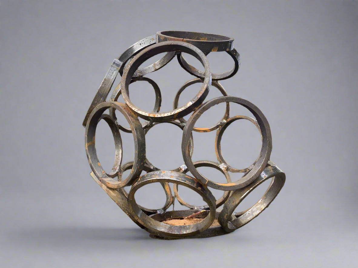 Modern Small Steel Garden Sculpture - 11" Sphere Art with geometric ring design. Weather-resistant metal ornament for patios or flower beds.