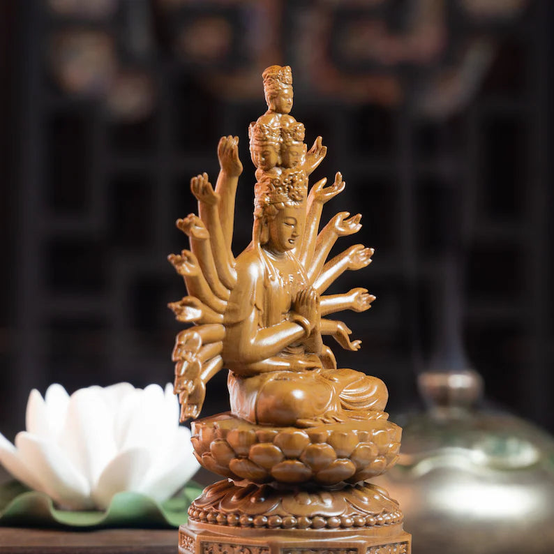Angled view of Guan Yin Wooden Meditation Statue with detailed facial features and arms. Enhances zen-inspired decor.