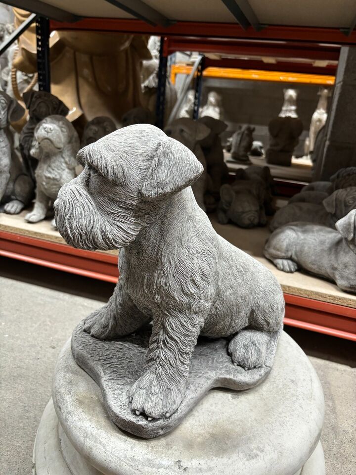 Side view of the 32cm tall Stone Schnauzer Garden Statue, showcasing realistic posture and fine craftsmanship for garden ornamentation.