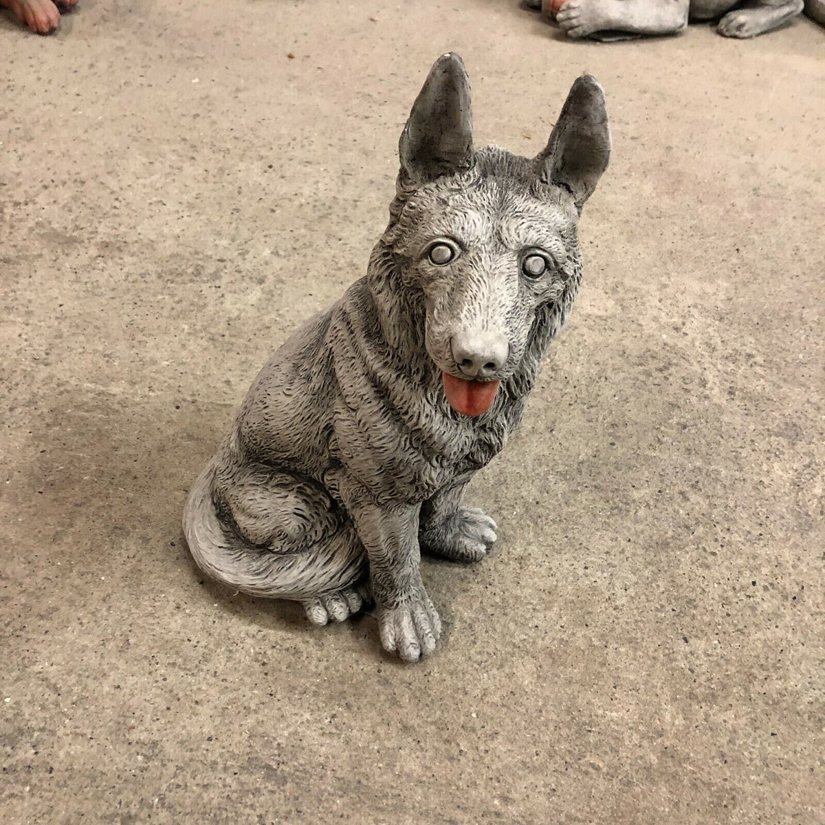 Front view of Alsatian Dog Stone Statue with lifelike texture, ideal for indoor or outdoor display in home and garden settings.