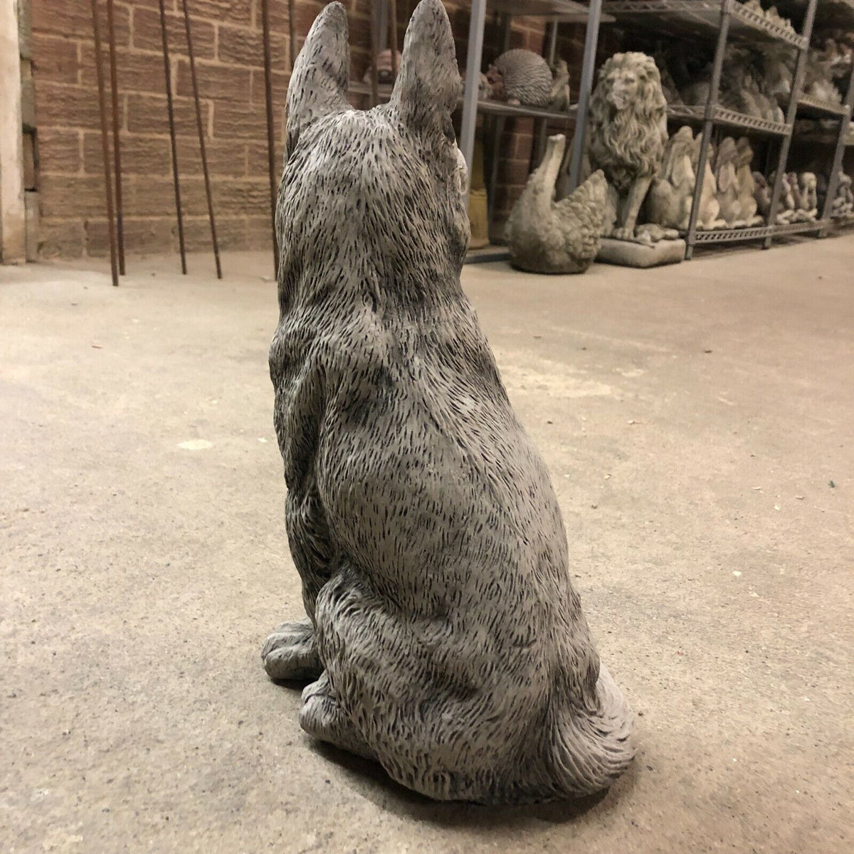 Back view of Alsatian Dog Stone Statue showing fine craftsmanship and weatherproof stone texture for long-lasting outdoor use.