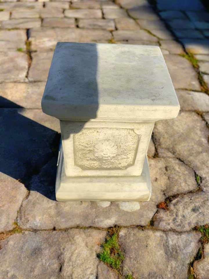 Durable square stone garden plinth with classic design, perfect for showcasing plants or sculptures on patios or paved areas.