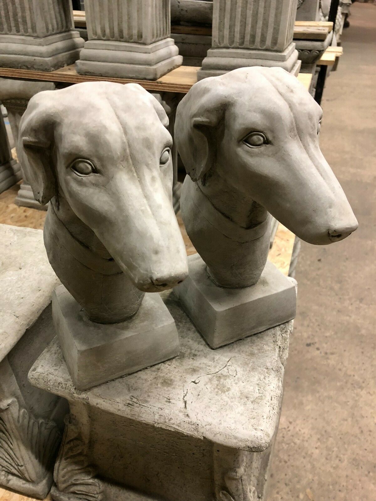 Pair of durable Stone Greyhound Garden Finials in antique finish, perfect for outdoor decor or ornamental pillar tops.