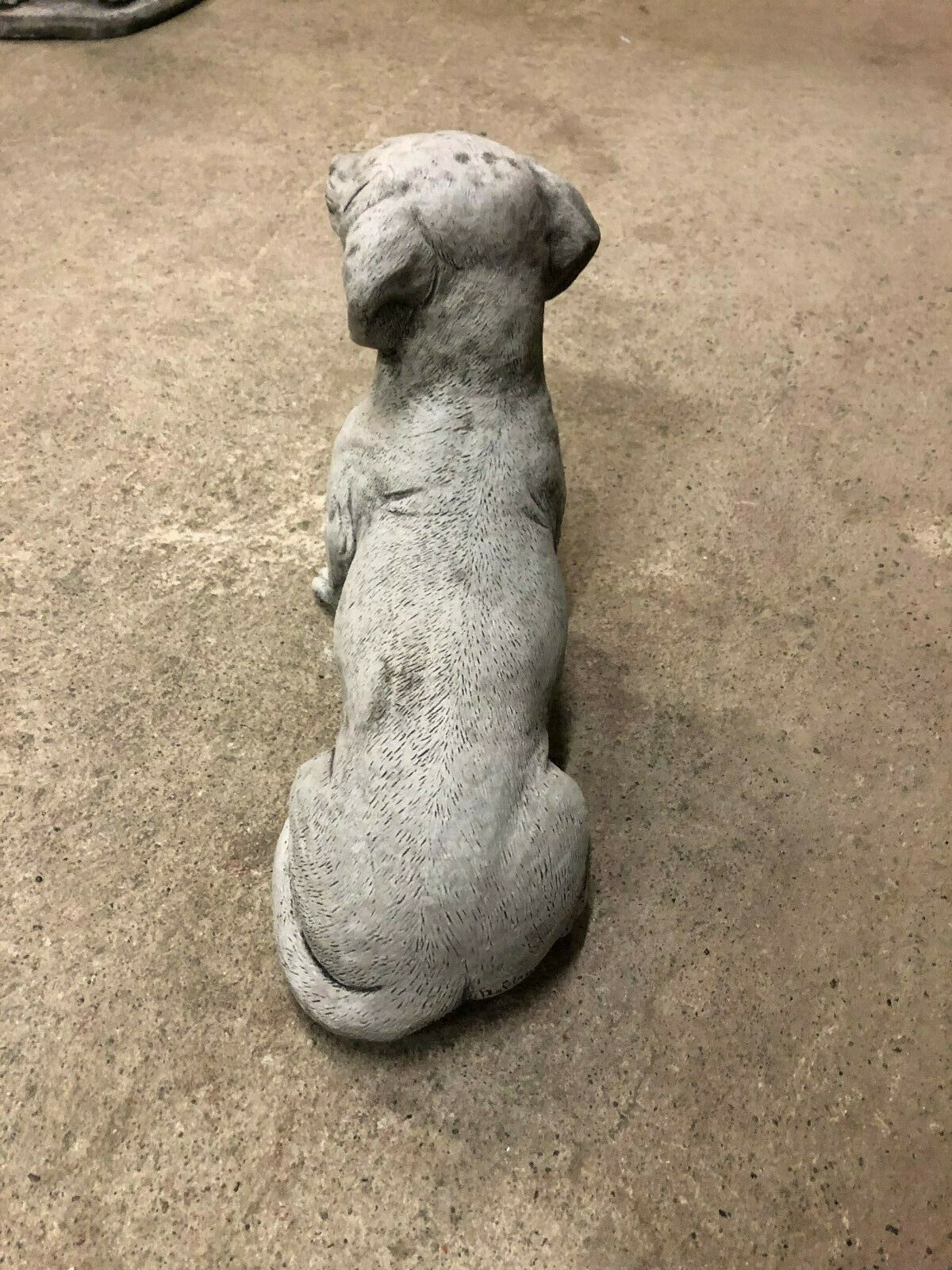 Rear view of Stone Sausage Dog Ornament highlighting realistic sculpted details and durable limestone material.