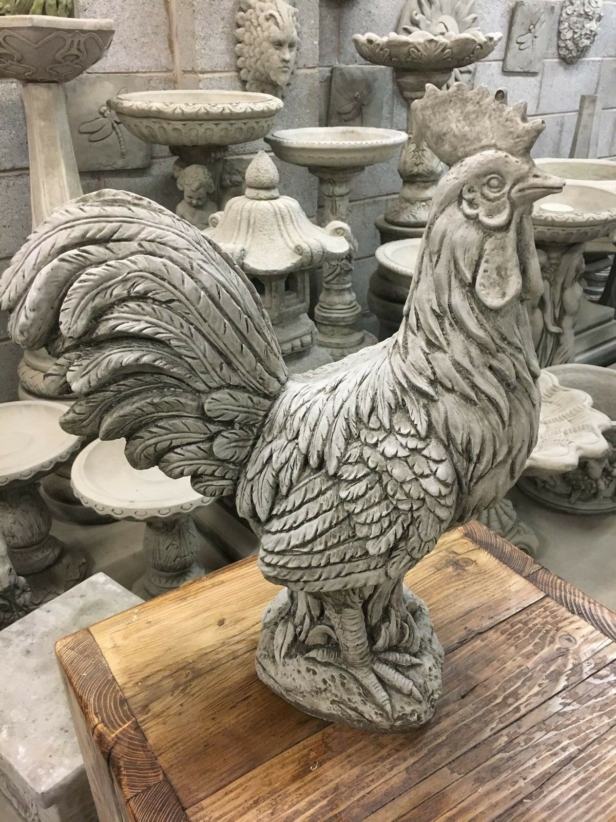 Life-like Stone Rooster Garden Decor featuring detailed feathers and solid limestone build, perfect for outdoor garden sculpture collections.