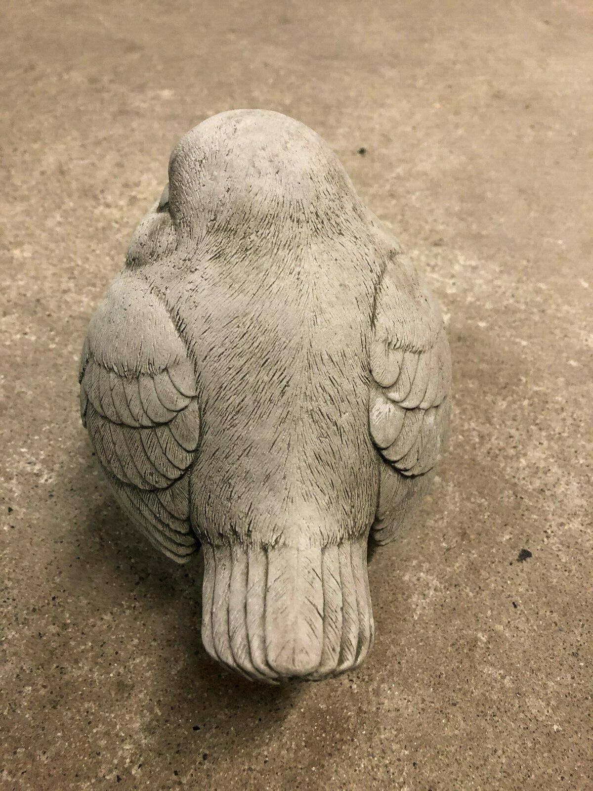 Rear view of Stone Garden Bird Ornament showing detailed tail and wing texture. Durable and decorative for garden or home use.