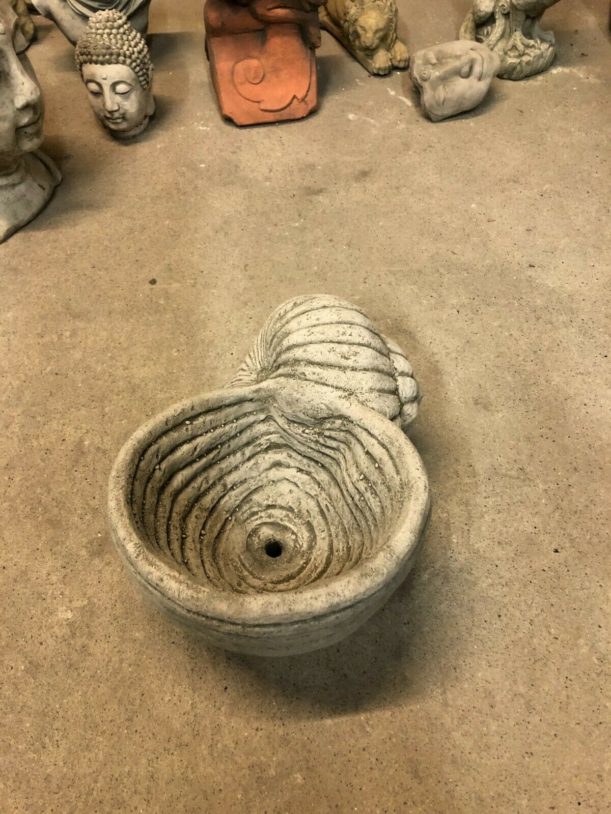 Top view of Garden Planter Pot - Stone Shell Design showing drainage hole and detailed interior texture, suitable for outdoor planting.