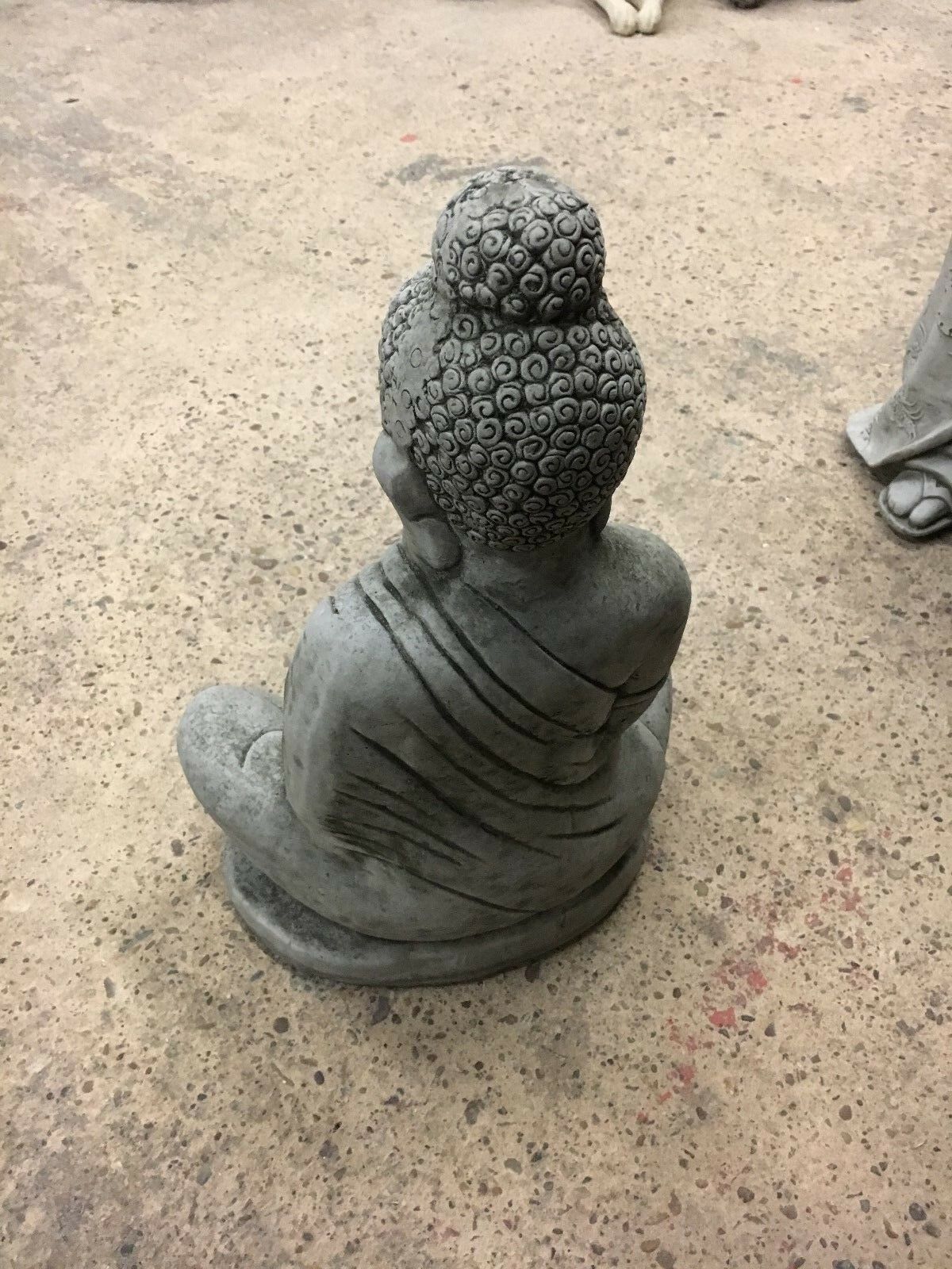 Rear view of Stone Buddha Statue in Jnana Mudra, displaying textured hair design and durable build for long-lasting garden ornament.