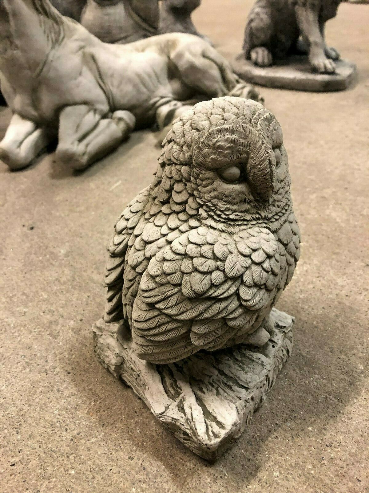 Realistic limestone Stone Owl on Log Garden Ornament, perfect for enhancing patios, flower beds, or lawn sculpture collections.