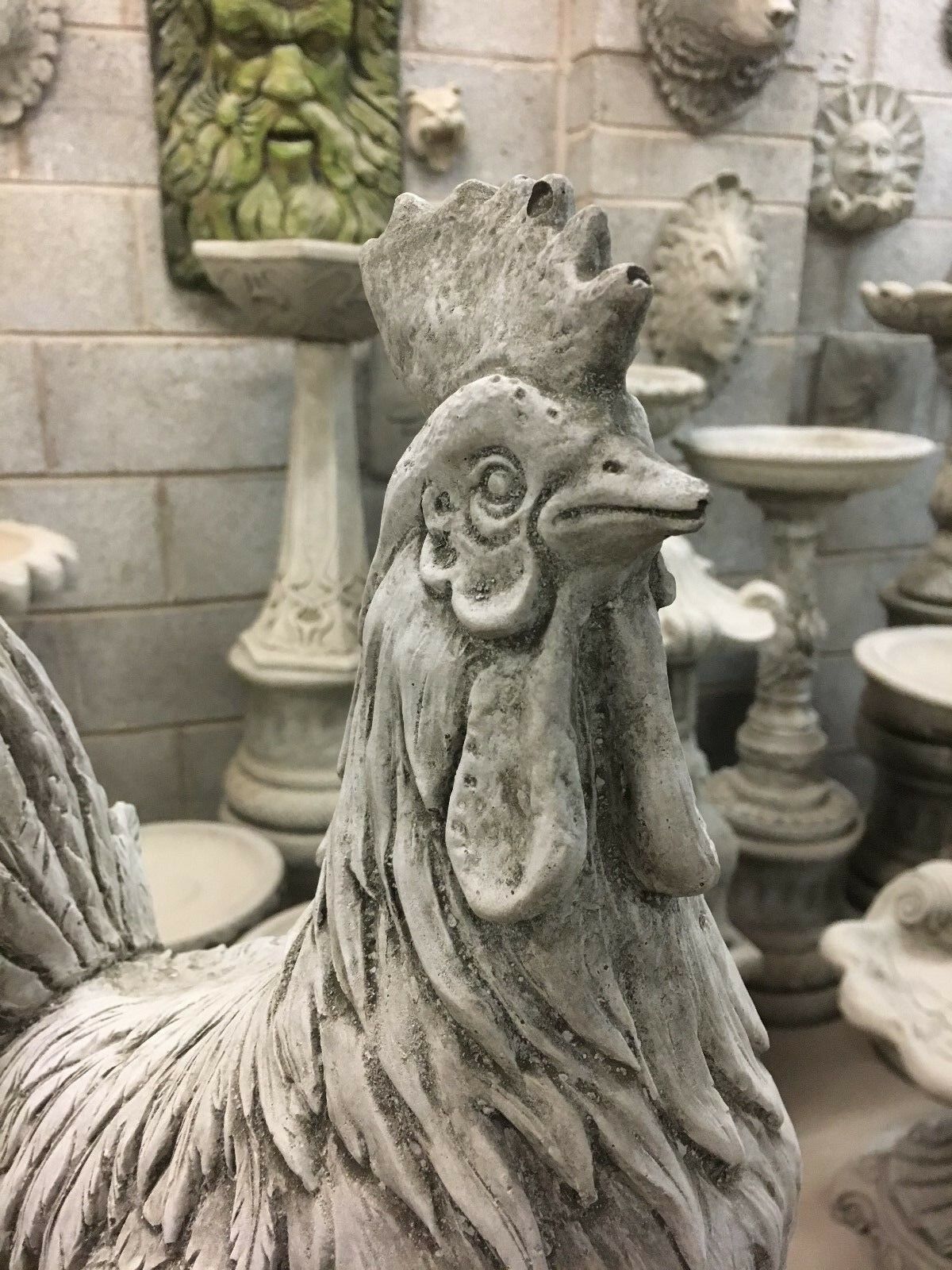 Close-up of Stone Rooster Statue head showcasing fine craftsmanship and antique grey finish, ideal for home and garden decor themes.