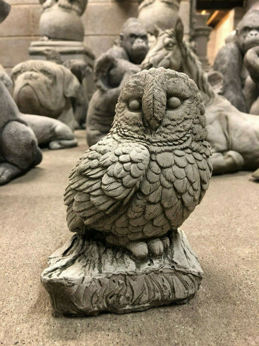 Stone Owl on Log Ornament with detailed feathers and limestone finish, ideal for garden decor and outdoor wildlife-themed displays.