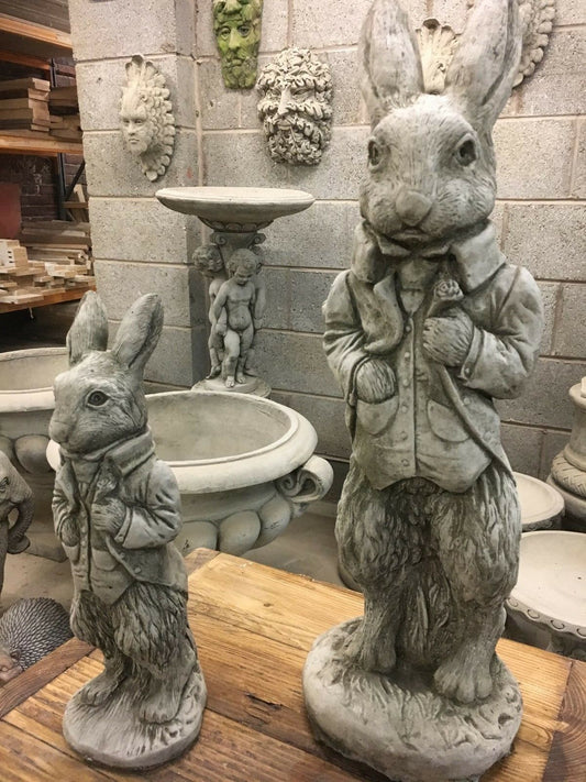 Garden Rabbit Stone Statues in large and small sizes, featuring fine detail and weather-resistant finish, ideal for outdoor lawn or patio decor.