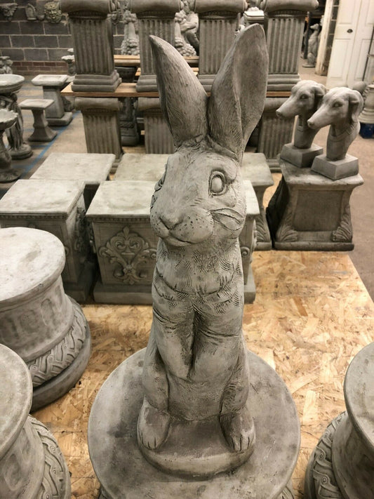 Solid Bunny Ornament - Stone Rabbit Garden sculpture with upright ears, crafted from durable limestone for outdoor decor in flowerbeds or lawns.