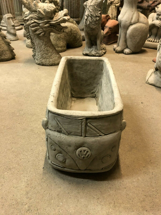 Front view of Stone VW Camper Van Planter with durable limestone design, ideal as a decorative garden feature with drainage hole.