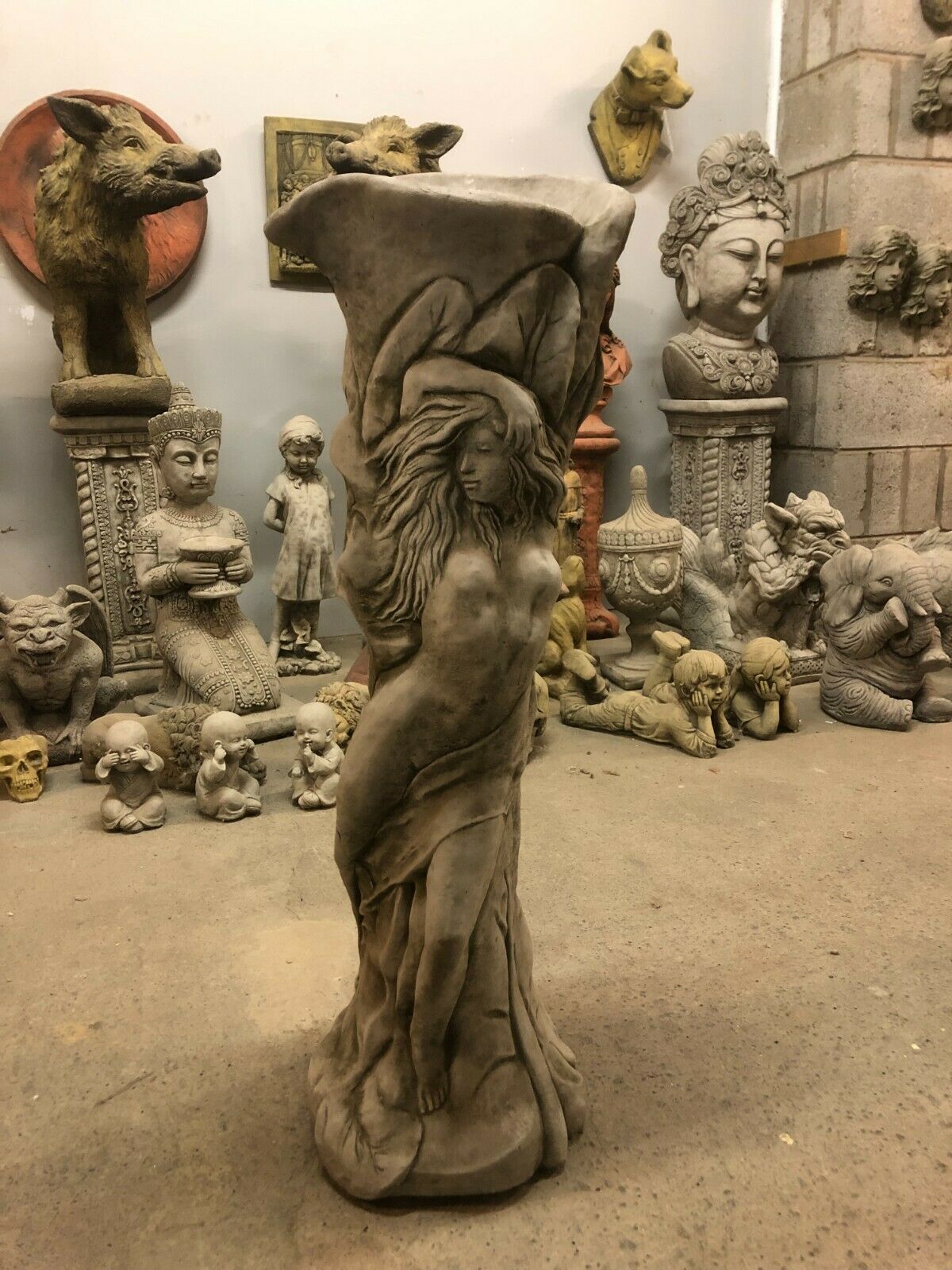 Stone Garden Planter Lady Statue with antique finish, 77cm tall, featuring a sculpted nude female figure entwined around a tall flower pot base.