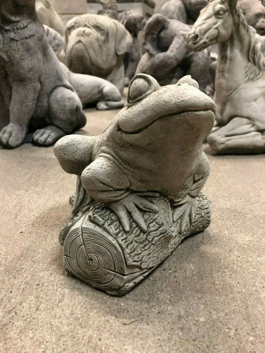 Stone Frog Garden Ornament on textured log base with antique finish, ideal for outdoor garden decor and lawn sculpture displays.